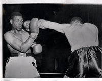 VALDES, NINO-JOHNNY HOLMAN WIRE PHOTO (1957)