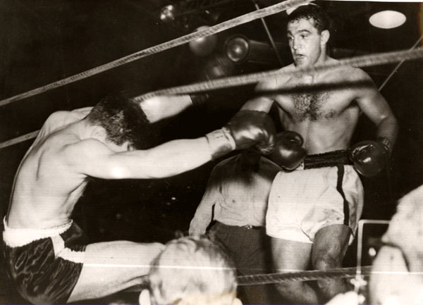 MARCIANO, ROCKY-ROLAND LASTARZA WIRE PHOTO (1953-11TH ROUND)