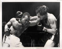 JONES, RALPH "TIGER"-CHARLES HUMEZ WIRE PHOTO (1956-4TH ROUND)