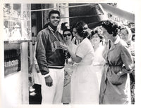 CLAY, CASSIUS 1960 OLYMPIC PHOTO (POSING WITH ITALIAN WOMEN)