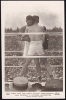 DEMPSEY, JACK-GEORGES CARPENTIER REAL PHOTO POSTCARD (1921-IN ACTION)