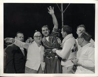 MARCIANO, ROCKY-EZZARD CHARLES II WIRE PHOTO (1954-POST FIGHT CELEBRATION)