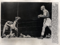 JOHNSON, HAROLD-ARCHIE MOORE WIRE PHOTO (1954-4TH ROUND)