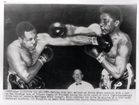 MOORE, ARCHIE-YOLANDE POMPEY WIRE PHOTO (1956-9TH ROUND)