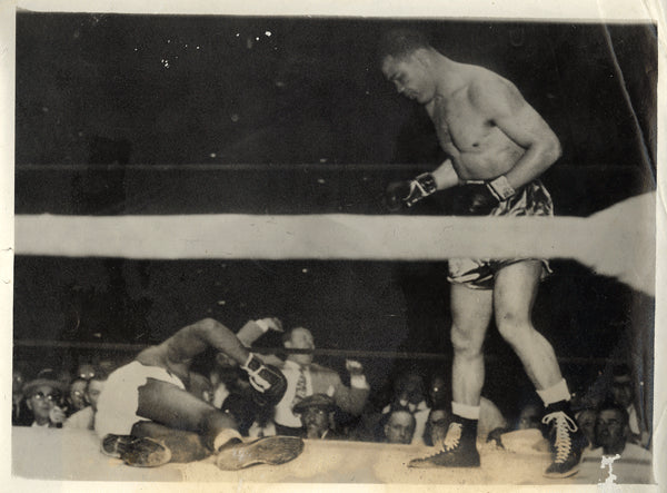 LOUIS, JOE-JERSEY JOE WALCOTT II WIRE PHOTO (1948-END OF FIGHT)