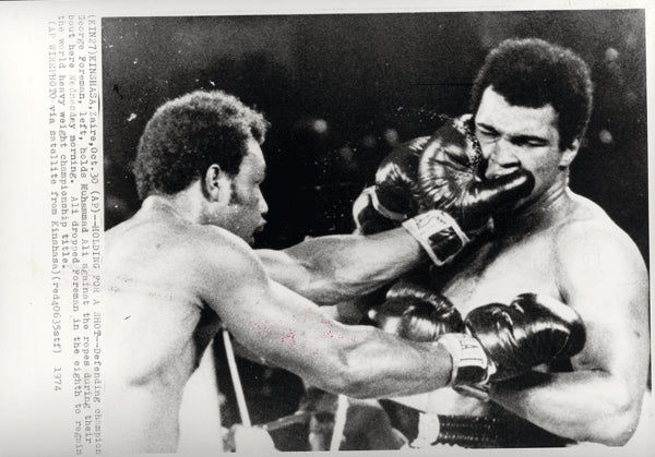 ALI, MUHAMMAD-GEORGE FOREMAN WIRE PHOTO (1974)