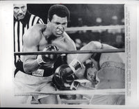 ALI, MUHAMMAD-GEORGE FOREMAN WIRE PHOTO (1974)