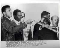 CLAY, CASSIUS-SONNY LISTON I WIRE PHOTO (1964-WEIGH IN)