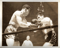 LOUIS, JOE-ABE SIMON WIRE PHOTO (1942-EXCHANGING BLOWS)