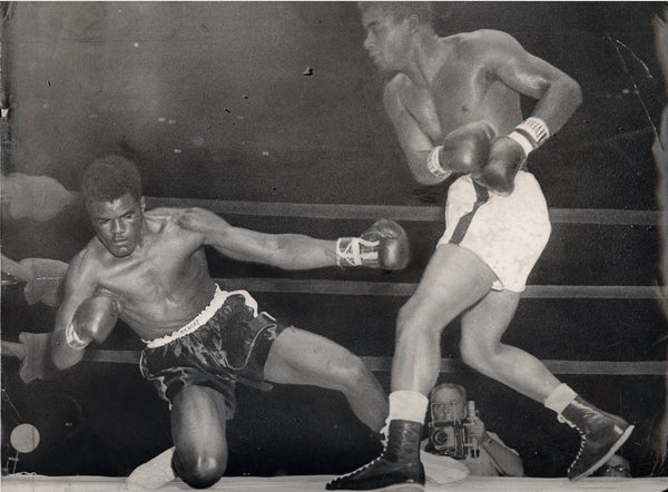 PATTERSON, FLOYD-TOMMY "HURRICANE" JACKSON LARGE FORMAT WIRE PHOTO (1957-JACKSON DOWN)