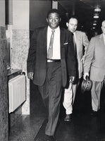 PATTERSON, FLOYD-TOMMY "HURRICANE" JACKSON LARGE FORMAT WIRE PHOTO (1957-POST FIGHT)