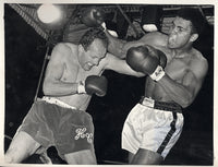 ALI, MUHAMMAD-HENRY COOPER II WIRE PHOTO (1966-4TH ROUND)