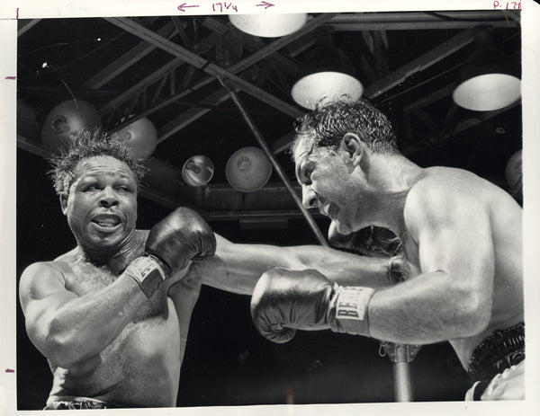 MARCIANO, ROCKY-ARCHIE MOORE WIRE PHOTO (1955-5TH ROUND)