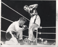 MARCIANO, ROCKEY-DON COCKELL WIRE PHOTO (1955-COCKELL DOWN)