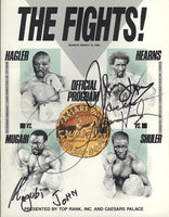 HAGLER, MARVIN-JOHN MUGABI & TOMMY HEARNS-JAMES SHULER SIGNED OFFICIAL PROGRAM (1986)