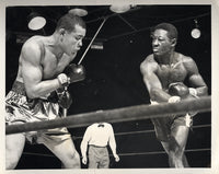 LOUIS, JOE-EZZARD CHARLES WIRE PHOTO (1950-4TH ROUND)