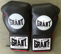 HOLYFIELD, EVANDER FIGHT WORN GLOVES (1997-MOORER TITLE UNIFICATION)