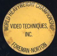 FOREMAN, GEORGE-KEN NORTON SOUVENIR PIN (1974)