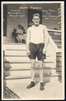 TUNNEY, GENE REAL PHOTO POSTCARD (1926-AT TRAINING CAMP FOR DEMPSEY)