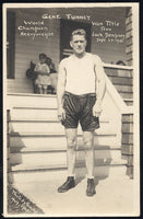 TUNNEY, GENE REAL PHOTO POSTCARD (1926-AT TRAINING CAMP FOR DEMPSEY)