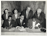 PATTERSON, FLOYD-ARCHIE MOORE WIRE PHOTO (1956-SIGNING CONTRACT)
