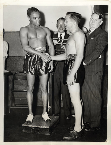 ARMSTRONG, HENRY-LOU AMBERS WIRE PHOTO (1938-WEIGHING IN)