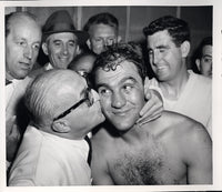 MARCIANO, ROCKY-EZZARD CHARLES I WIRE PHOTO (1954-POST FIGHT)