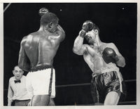 MARCIANO, ROCKY-EZZARD CHARLES II WIRE PHOTO (1954)