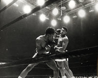 CLAY, CASSIUS-CHARLEY POWELL ORIGINAL WIRE PHOTO (1963)