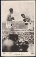 DEMPSEY, JACK-GEORGES CARPENTIER REAL PHOTO POSTCARD (1921-IN ACTION)