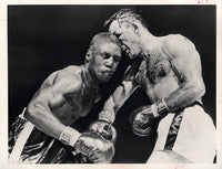 BASILIO, CARMEN-JOHNNY SAXTON II WIRE PHOTO (1956-9TH ROUND)