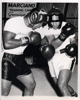 MARCIANO, ROCKY-TOXIE HALL SPARRING WIRE PHOTO (1955-PREPARING FOR MOORE)