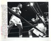 DOKES, MICHAEL-RAZOR RUDDOCK WIRE PHOTO (1990)