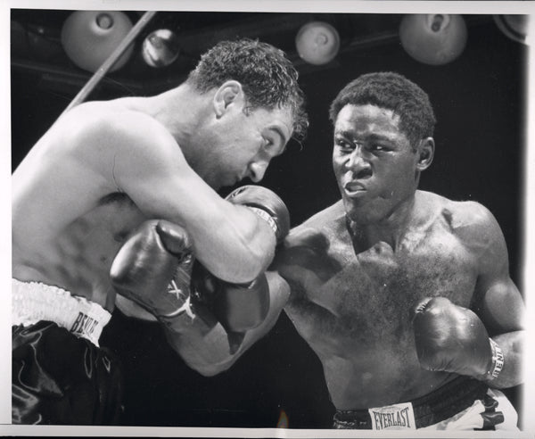 MARCIANO, ROCKY-EZZARD CHARLES I ORIGINAL WIRE PHOTO (1954-2ND ROUND)