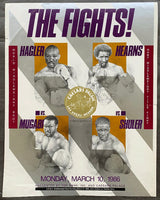 HAGLER, MARVIN-JOHN MUGABI & TOMMY HEARNS-JAMES SHULER ON SITE POSTER (1986)