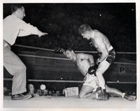 MARCIANO, ROCKY-LEE SAVOLD WIRE PHOTO (1952-6TH ROUND)