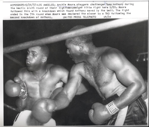MOORE, ARCHIE-TONY ANTHONY WIRE PHOTO (1957-6TH ROUND)