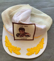 ALI, MUHAMMAD FOUR TIME WORLD HEAVYWEIGHT CHAMPION CAP (1980)