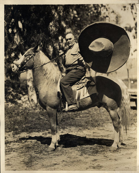 JEFFRIES, JAMES J. ORIGINAL WIRE PHOTO (1930-RIDING HORSE)