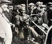 JOHNSON, JACK PHOTOGRAPH (DRIVING HIS MOTOR CAR)