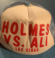 ALI, MUHAMMAD-LARRY HOLMES SOUVENIR CAP (1980)