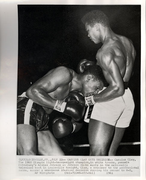 CLAY, CASSIUS-ALONZO JOHNSON WIRE PHOTO (1961)