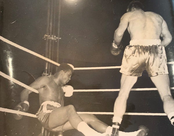 CLAY, CASSIUS-HENRY COOPER I ORIGINAL WIRE PHOTO (1963-4TH ROUND)