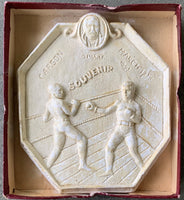 CORBETT, JAMES J.-ROBERT FITZSIMMONS SOUVENIR PLASTER RELIEF IN ORIGINAL BOX (1897)