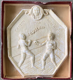 CORBETT, JAMES J.-ROBERT FITZSIMMONS SOUVENIR PLASTER RELIEF IN ORIGINAL BOX (1897)