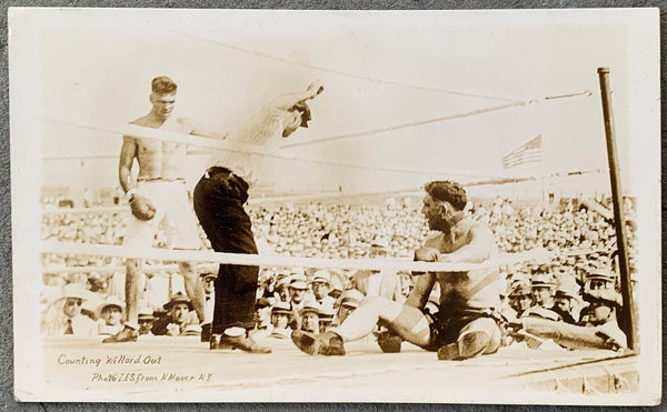 DEMPSEY, JACK-JESS WILLARD REAL PHOTO POSTCARD (1919-END OF FIGHT)