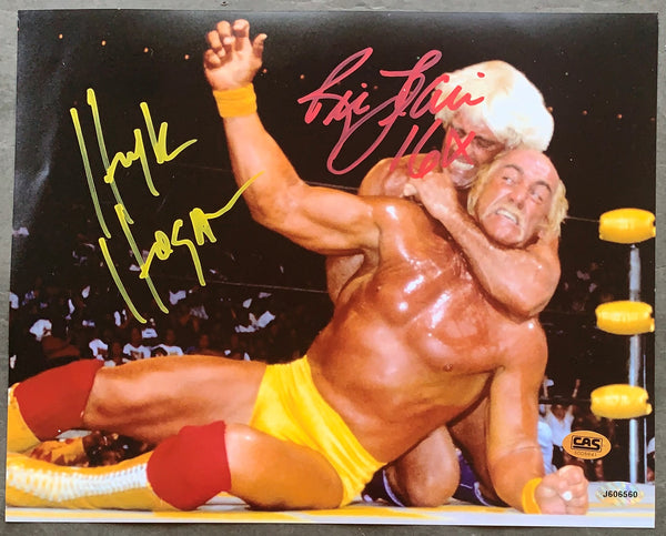 HOGAN, HULK & RIC FLAIR SIGNED ACTIONPHOTOGRAPH (CAS & AUTHENTICATED INK)