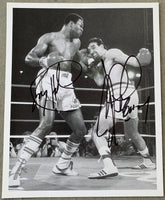HOLMES, LARRY & GERRY COONEY SIGNED ACTION PHOTO