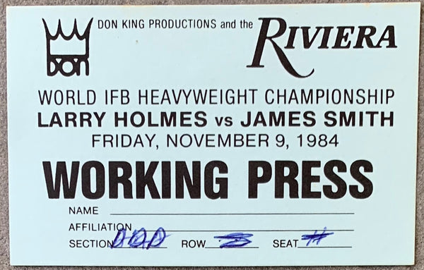 HOLMES, LARRY-JAMES "BONECRUSHER" SMITH WORKING PRESS PASS (1984)