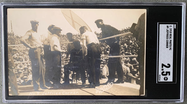 JOHNSON, JACK-JAMES JEFFRIES REAL PHOTO POSTCARD (1910-JEFFRIES IN HIS CORNER-SGC)